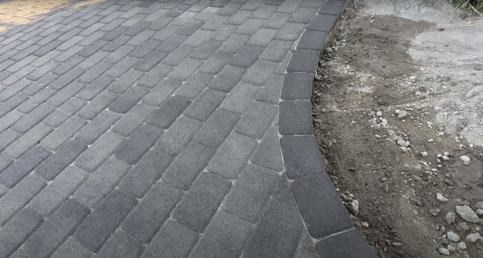 Professional paver and concrete installation Precision paver installation showing expert craftsmanship